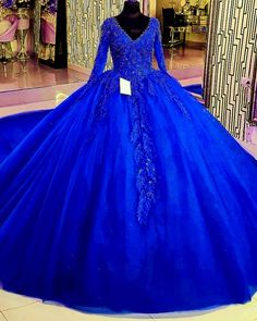 Royal Fitted Ball Gown For Quinceanera, Long Sleeve Ball Gown For Quinceanera And Prom Season, Royal Floor-length Ball Gown For Debutante Ball, Royal Ball Gown For Wedding And Prom Season, Royal Blue Fitted Ball Gown For Wedding, Royal Blue Tulle Evening Dress For Wedding, Royal Ball Gown For Wedding, Royal Ball Gown Evening Dress For Wedding, Royal Blue Ball Gown With Fitted Bodice For Wedding