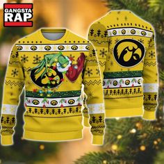 NCAA Iowa Hawkeyes Grinch Hand Ugly Christmas Sweater Get ready to embrace the festive spirit with the NCAA Iowa Hawkeyes Grinch Hand Ugly Christmas Sweater. This eye-catching piece of holiday apparel blends **Christmas cheer** with a dash of college pride, making it the perfect choice for both fans of the Iowa Hawkeyes and those looking to participate in the growing trend of **ugly sweater parties**. Crafted from high-quality **knitwear**, this sweater features a playful **Grinch Hand** design Grinch Ugly Christmas Sweater, Unique Ugly Christmas Sweater, Grinch Characters, Grinch Hands, Christmas Ugly Sweater, Christmas Grinch, Ugly Sweater Party, Warm Christmas, Funny Xmas