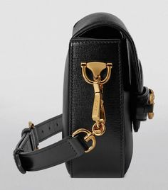 This mini iteration of Gucci’s Horsebit 1955 bag may be petite in size, but it makes as much of an impact as its larger styles. The double ring and bar design spotlighted on the front is one of the brand’s signature borrowings from the equestrian world, a detail that has become part of the House’s code – it’s as recognisable as the Web stripe that adorns the strap. Gucci Mini, Double Ring, S Signature, Gucci Bags, Bar Design, Women's Bags, Harrods, Gucci Bag, The Borrowers