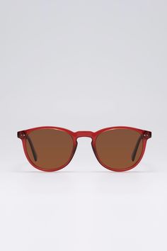 Frame: Red Lenses: Brown Lenses: 49 mm, Bridge: 21 mm, Temples: 142 mmFlattering on all face shapes. Red acetate sunglasses with a modern take on the classic round shape - set with tinted lenses for sun protection. Modern Red Cat Eye Sunglasses With Gradient Lenses, Classic Red Cat Eye Sunglasses, Modern Red Cat Eye Sunglasses With Uv Protection, Red Cat Eye Polarized Sunglasses, Modern Red Sunglasses With Gradient Lenses, Red Cat Eye Sunglasses With Uva Protection, Red Sunglasses With Gradient Lenses Modern Style, Trendy Red Wayfarer Sunglasses, Modern Red Sunglasses With Tinted Lenses