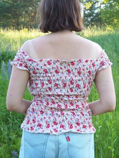 Vintage 90s pink floral print ruffle off shoulder top Top is in great vintage condition. SIZE. Model usually wears UK 12 / M, top could fit UK 10-12 / S-M. Please, check the measurements before buying. MEASUREMENTS. Fabric is stretch. Bust - 78 cm, length - 50 cm. Item is made from mixed material. Color may differ slightly depending on the color calibration of the device you're viewing on. If You have more questions about products or shipping, please drop me a message. Wish You great shopping, M Fitted Ditsy Floral Print Tops For Spring, Spring Off-shoulder Ruffled Top, Fitted Ruffled Off-shoulder Top For Summer, Casual Pink Off-shoulder Top For Spring, Fitted Off-shoulder Floral Print Top, Summer Floral Print Off-shoulder Top, Short Sleeve Rose Print Tops For Summer, Off-shoulder Floral Print Summer Top, Summer Off-shoulder Top With Ruffles