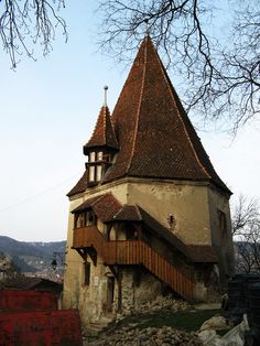 an old building with a steeple on top