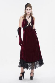 This gothic long dress is made of velvet fabric and the hem is patchwork with lace. Floral embroidery and multi-chains on the neckline and back. Lace-up halterneck. Adjustable shoulder straps. Good elastic fabric.Available in two colors. Color:  Red Materials:  Polyester; Elastane Notice:  Other Accessories Are Not Included Style Types:  Gothic Version:  Fitted Soft Index:  Fit Elastic Index:  Good Elastic Thickness Index:  Tran Sparent Size Length (in) Bust (in) Waist (in) XS 54.3 25.6 25.6 S 5 Gothic Long Dress, Lace Gothic Dress, Corsets Fashion, Slip Wedding Dress, Velvet Gloves, Rock Style Outfits, Gothic Lingerie, Style Types, Bridal Corset