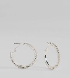 Add a pretty sparkle to all of your 'fits with these gorg rhinestone hoop earrings! They feature a medium metal hoop design with all-around rhinestone embellishments. Include an omega closure. Style these hoop earrings with a dainty necklace for everyday glamour!Fit & FeaturesMedium metal hoop designRhinestone embellishmentsOmega closure, rubber stopperEarrings are final sale and may not be returned or exchanged. Trendy Hoop Jewelry With Rhinestones, Trendy Silver Hoop Earrings With Rhinestones, Small Hoop Earrings With Rhinestones In Cubic Zirconia, Trendy Metal Hoop Earrings With Rhinestones, Cheap Rhinestone Hoop Earrings, Metal Hoop Jewelry With Rhinestones, Silver Hoop Earrings With Rhinestones, Cheap Crystal Rhinestone Hoop Earrings, Small Hoop Earrings With Rhinestones