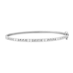 You'll get the best of most worlds with this brilliant bangle. Adorned in alternating diamonds and gold pyramids, she is as shiny as she is sleek. Your wrist game is going to be gleaming with this bracelet. Available in 14k yellow, rose, or white gold .65ctw diamonds Measures 2.6mm wide One sided By Curated by AB Diamond Bangle Bracelet, Wrist Game, Diamond Bangles Bracelet, Diamonds And Gold, Diamond Bangle, One Sided, Yellow Rose, Pyramid, Bangle Bracelet