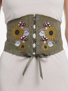 Keep your outfit hauntingly cute during your forest strolls with this olive corduroy corset! Featuring embroidered mushrooms and sunflowers on the front with lace-up detailing. Comes with a back zipper closure.PolyesterImported Ghost Mushroom, Embroidered Mushrooms, Mushroom Outfit, Mushroom Costume, Blair Witch Project, Hello Kitty House, Disney Dragon, Exploding Kittens, Bee And Puppycat