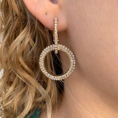 Brilliant cubic zirconia catches the light with every movement in this double loop statement earring. Elevate your jewelry collection with this versatile earrings that effortlessly transition from day to night. Double loop with Pave CZ Post Back Clip Modern Cubic Zirconia Earrings For Party, Modern Party Earrings With Cubic Zirconia, Modern Sparkling Jewelry For Party, Chic Hoop Earrings With Cubic Zirconia, Chic Cubic Zirconia Hoop Earrings, Elegant Hoop Earrings With Rhinestones, Elegant Hoop Rhinestone Jewelry, Modern Jewelry With Rhinestones And Cubic Zirconia, Modern Evening Earrings With Cubic Zirconia