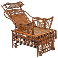 an old wooden chair and ottoman with wicker on the back, sitting next to each other