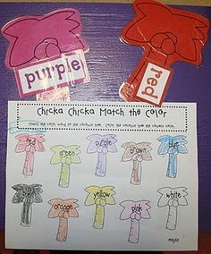 a bulletin board with clothes and name tags for the word'purple bear'on it