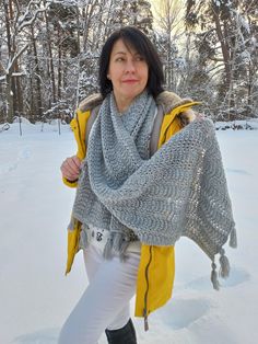 "Hand knitted grey shawl / scarf is made of 49% merino wool and 51% acrylic yarn. It's very soft , warm and cosy, may complete Your evening gown or make You feel comfortable during autumn and winter with coat, raincoat or jacket.  Perfect gift for You or Your loved ones.  Dimensions (aprox., without tassels):    44cm x 179 cm 17 \" x 71\" inches. If You like this design, but need another size, color or yarn type, with or without tassels, please contact me to discuss other options for Your custom order.  Care instructions: handwash or machine wash in gentle cycle 30 - 40 C, using detergents for wool or delicates. Do not twist, dry flat.  Please note, that post offices are very busy closer to winter holidays, so place Your order in time to get it by Christmas :)" Gray Winter Shawl Scarf, One Size Gray Shawl For Winter, Gray One-size Shawl For Winter, Knitted Alpaca Shawl Scarf, Winter Wool Shawl, Winter Knit Shawl Wrap, Alpaca Shawl For Winter, Winter Alpaca Shawl, Cozy Merino Wool Shawl For Winter