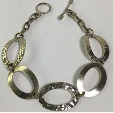 This fantastic and fun sterling silver bracelet looks very much like a Silpada style but was made in Mexico.  It is marked Mexico and 925 for sterling silver.  It weighs about 10.1 grams and is about 7.5 inches long.  Three of the links have a textured finish and two are plain, for added interest.  In great vintage condition and ready to wear or give as a gift! Check out the photos for additional information.  If you'd like more photos, just ask.  Please feel free to message me if you have quest New Castle, Jewelry Sterling Silver, Sterling Silver Bracelet, Chain Link Bracelet, Estate Jewelry, Dream Wardrobe, Sterling Silver Bracelets, Link Bracelets, Chain Link