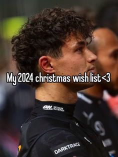 a close up of a person wearing a black shirt and text that reads my christmas wish list - 3