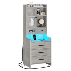 a gray cabinet with blue light under it