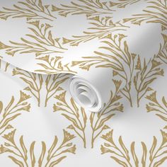 a wallpaper with gold leaves on it