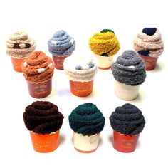 there are many cupcakes that have been made out of crocheted yarn