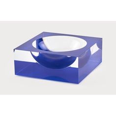 a blue box with a white bowl in it