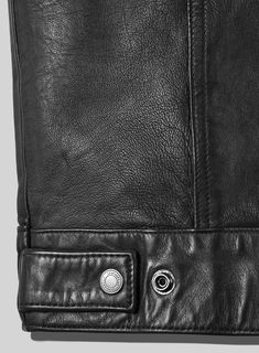 Our Maverick Trucker Leather Jacket is a must-have for those looking to make a sophisticated statement. A classic and timeless wardrobe staple, this versatile piece is crafted with the highest quality leather to ensure a unique and luxurious look.     With its rugged yet easy aura, this stylish jacket will bring cool confidence to any look for the season ahead.   Made Using Pure Napa Sheep Skin Soft Leather.   Look Includes     Black Washed and Waxed  Leather   Antique Silver Hardware     You can change the trims during customization if required.    Made as per your measurements. Leather Biker Jacket With Flap Pockets, Leather Biker Outerwear With Flap Pockets, Luxury Leather Biker Jacket With Pockets, Classic Leather-lined Biker Jacket For Business, Rugged Leather Biker Jacket For Workwear, Classic Leather Jacket With Flap Pockets, Classic Biker Jacket With Flap Pockets, Black Leather Biker Jacket With Flap Pockets, Classic Leather Biker Jacket With Button Closure