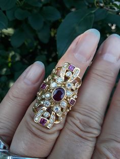 Absolutely Stunning 18k Yellow Gold, Diamond Ruby Navette ring... All sales are final, no return. Good Vintage Pre Owned Condition. One small side ruby have tiny chip in the corner. Don't see when u wearing ring. Selling As Is. Size 6. Weight over 14 Grams. Custom made. Some Pics ENLARGED To See Details. Designer Multi-stone Rings For Formal Occasions, Luxury Hallmarked Ruby Wedding Ring, Designer Wedding Rings With Diamond Accents, Designer Hallmarked Diamond Ring For Wedding, Designer Wedding Diamond Ring, Navette Ring, Columbian Emeralds, How To Wear Rings, Rings Collection