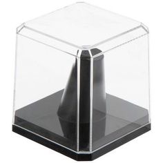 a black object in a clear box on a white background