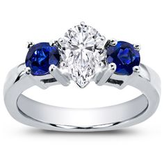 This engagement setting is accented with two round sapphires measuring 4.2mm each. Round Sapphire, Engagement Sets, Pear Cut, Lab Grown, Lab Grown Diamonds, Pear, Sapphire, Lab, White Gold