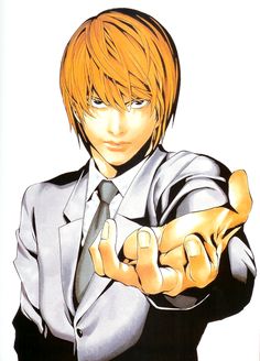 an orange haired man in a suit and tie pointing his finger at the camera with both hands