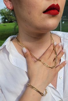 This paper clip chain is perfect for the classy lady who likes to stay on trend. This chain is made from 14k gold and is held by a lobster clasp - it cannot get more stylish than that. DETAILS * Metal: Gold * Purity: 14K (Stamped 14K for Authenticity) * Width: 2.6mm,3.2mm, 3.8mm, 4.5mm, 5.5mm * Length Bracelet: 7in 7.5in 7.75in 8.25in * Weight : Apox Average 0.28 grams/ per inches (4.5 mm bracelet), 0.44grams/per inches(5.5mm bracelet ) Thank you for looking at our shop!! Let us know if you have Luxury Yellow Gold Bracelet With Paperclip Chain, Luxury Paperclip Bracelet With Complimentary Chain For Formal Events, Luxury Classic Gold Chain Paperclip Bracelet, Luxury Classic Paperclip Chain Bracelet, Luxury Gold Bracelet With Paperclip Chain As Gift, Luxury Box Chain Paperclip Bracelet, Cheap Women's Jubilee Chain Bracelet, Elegant Luxury Gold Bracelet With Paperclip Chain, Luxury Yellow Gold Paperclip Bracelet With Adjustable Chain