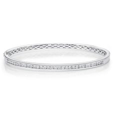 Memoire 18k white gold 58x52mm bangle bracelet with 33 channel set diamonds weighing .95cts , hinged clasp 18k White Gold 58x52MM Channel set 33 Diamonds = .95cts GH-SI quality Hinged Clasp Classic Diamond Pave Bangle Bracelet, Platinum Bangle Diamond Bracelet With Diamond Cut, Platinum Bangle Diamond Bracelet, Platinum Diamond Cut Bangle Bracelet, Formal Diamond Bangle, Luxury Channel Set Diamond Bangle Bracelet, Luxury Silver Bangle With Channel Set, Elegant Diamond Channel Set Bangle, Luxury Diamond Channel Set Bangle