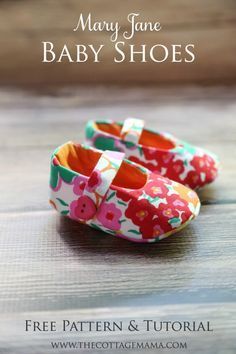 two baby shoes sitting on top of a wooden table with the title mary jane baby shoes