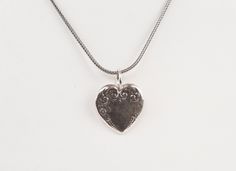 Sterling Silver Heart Pendant Necklace Silver Heart Necklace With Sterling Silver Clasp As Gift, Elegant 925 Stamped Heart Pendant Necklace, Elegant Double Heart Nickel Free Necklace, Classic Sterling Silver Heart Necklace For Gift, Classic Sterling Silver Heart Necklace As Gift, Classic Silver Heart Necklace For Gift, Elegant Heart Necklace For Valentine's Day Memorial, Elegant Heart Charm Necklace For Memorial, Elegant Heart Charm Necklace For Memorials