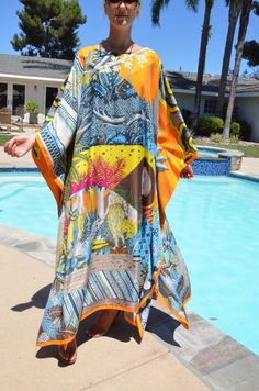 Absolutely stunning designer print, silk caftan, with it's breathtaking art print, would be a very special addition to your wardrobe. This luxurious, silk caftan is the height of glamour for beach, pool, that special vacation or just looking fantastic lounging or entertaining. One size. Fits many sizes, small to X-large. The width, edge to edge, is 54 inches or 108 inches around the body. The length is 52 inches. The side seams are 7 inches from the edge and can be adjusted if needed. The neckli Silk Caftan, Silk Kaftan, Dress Silk, Beach Pool, Silk Printing, Silk Dress, In The Heights, Cover Up, Print Design