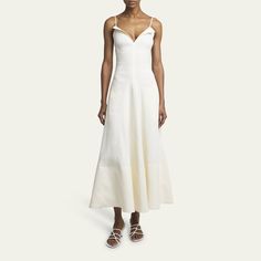 Proenza Schouler "Ruby" dress crafted from an eco stretch linen-blend fabrication  V neckline Sleeveless Full length A-line silhouette Invisible back zipper  Linen/viscose/elastane Dry clean Made in Italy