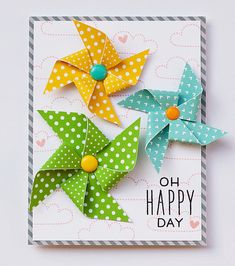 three origami flowers on a card with the words oh happy day written below