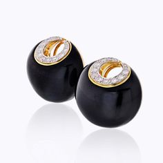 David Webb black enamel and diamond crescent ear-clips. Make a statement in these oversized bombe clip-earrings. Slick black enamel and a touch of diamonds adds enough glam and make a huge impact. These earrings are in perfect condition and show no signs of wear. W: 1.1 inches L: 1 inchCenter Diamond Weight: 0.00Measurements: Width: 1.1 inchesMetal Type: Platinum & 18K Yellow GoldMetal Weight: 49.4 gr.Signed: WEBBCondition: Excellent.Stock: RR6448 Luxury Black Round Clip-on Earrings, Black Enamel Clip-on Earrings For Evening, Luxury Black Clip-on Earrings For Formal Occasions, Luxury Polished Finish Clip-on Earrings For Evening, Luxury Polished Clip-on Earrings For Evening, David Webb, Ear Clips, Clip Earrings, Black Enamel