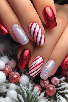 Get festive with these classic red and white candy cane nails featuring a stunning glitter accent! The traditional stripes shine brightly with an eye-catching glitter finish on the accent nails, making your manicure pop while keeping it chic and stylish. Perfect for holiday parties or cozy gatherings, these nails are a sweet way to celebrate the season! 🎄✨💅 #NailArt #CandyCaneNails #GlitterNails #ChristmasNailDesigns #HolidayNailInspo Holiday Nails Designs Christmas, Christmas Nail Designs Easy Short Nails, Red Nails For Holidays, Candy Cane Nails Almond Shape, Sparkly Candy Cane Nails, Christmas Nails Festive, December Nails Red And White, Red Candy Cane Christmas Nails, French Candy Cane Nails