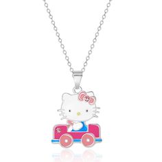 a hello kitty necklace with a train on it's back and the word hello kitty written