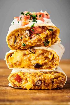 three burritos stacked on top of each other