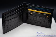 Introducing the Black Alligator Handmade Wallet - a timeless accessory that exudes elegance and craftsmanship. This wallet, meticulously crafted with attention to detail, combines the unique texture of alligator leather and the softness of Italian goat leather. Its sleek all-black design, both inside and out, along with exquisite hand-stitched stitching, makes it a standout piece. The dimensions of this wallet, when closed, are a compact 3.3 x 4.4 inches, making it perfect for slipping into pock Business Bifold Wallets With Crocodile Pattern, Luxury Wallets With Crocodile Pattern For Business, Luxury Business Wallets With Crocodile Pattern, Luxury Crocodile Pattern Wallets For Business, Luxury Crocodile Pattern Wallet For Business, Luxury Crocodile Pattern Business Wallets, Elegant Crocodile Pattern Formal Wallets, Handmade Bifold Wallet For Formal Occasions, Classic Handmade Wallets For Formal Occasion