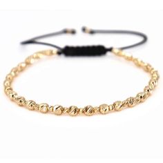 14K Solid Gold Bead Bracelet, Gold Ball Bracelet, Diamond Cut Bracelet, Gold Italian Bracelet, Real Gold Bracelet, Perfect Gift for Him ✨Expertly handmade, this elegant bracelet showcases a total of 57 finely crafted beads in 14K gold, featuring 30 beads at 2.5 mm and 27 beads at 4 mm, arranged in an alternating pattern, all on a highly flexible adjustable cord. The total gold weight is 3.87 grams. The intricate arrangement of varying bead sizes adds a textured and refined look, enhancing the br Adjustable Yellow Gold Braided Bracelet With Jubilee Detail, Adjustable Gold Braided Bracelet With Strap, Elegant Gold Friendship Bracelets With Spacer Beads, Adjustable Bracelets With Spacer And Round Beads, Adjustable Gold Beads Bracelet, Elegant Gold Hand-strung Friendship Bracelets, Elegant Gold Friendship Bracelets With Gold Beads, Adjustable Yellow Gold Pearl Bracelet With Round Beads, Adjustable Gold Rosary Bracelet With Jubilee Detail