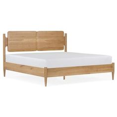 a bed with wooden frame and headboard made from solid wood, on an isolated white background