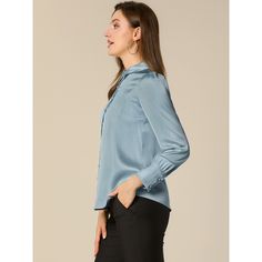 Pair perfectly with your favorite skirts or jeans for a chic look. This satin shirt is a throw-on piece. Wearing this, you can create your stunning chic look effortlessly, and you can be subtly elegant for work now and flirtatiously playful the next. Add this versatile piece to your everyday wardrobe. It can be dressed up or down. The relaxed fit enhances the laid-back look with a bit of glamour. Trendy Blue Blouse With Button Cuffs, Light Blue Buttoned Blouse For Fall, Light Blue Button-up Blouse For Work, Office Lady Button-up Top With Buttons, Light Blue Buttoned Blouse For Work, Chic Blue Blouse With Button Cuffs, Light Blue Buttoned Tops For Work, Light Blue Button Blouse For Work, Light Blue Blouse With Button Cuffs