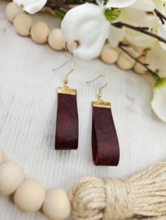 Beautiful, fun genuine leather earrings.  Perfect for everyday wear or special occasions. You will love these trendy, genuine leather earrings.  Each pair is handmade by us with lead free, stainless steel hooks. They hang at approximately 2.5 inches for the perfect everyday look. All earrings may vary slightly due to leather patterns. Colors may vary slightly due to screen variations. Modern Brown Leather Earrings, Trendy Brown Jewelry For Everyday Use, Trendy Leather Earrings For Everyday, Adjustable Drop Earrings For Everyday Use, Minimalist Brown Leather Earrings, Trendy Brown Leather Jewelry, Brown Leather Minimalist Earrings, Leather Dangle Earrings With Ear Wire, Trendy Brown Faux Leather Jewelry