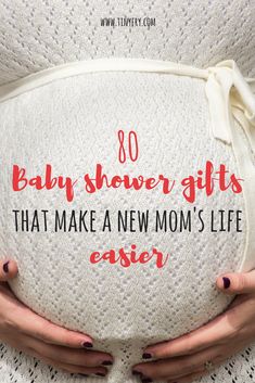 a pregnant woman holding her belly with the words, baby shower gifts that make a new mom's life easier