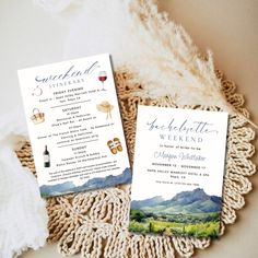 two wedding programs sitting on top of a doily next to a bottle of wine