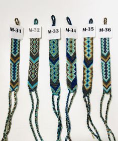 four different types of beaded bracelets on display