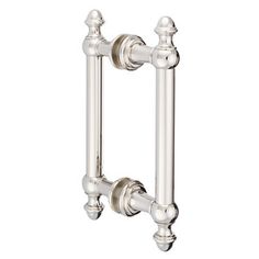 an antique style towel rail with two handles and knobs on the sides, in polished silver