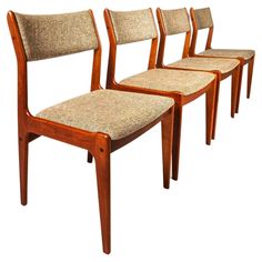 set of four danish teak dining chairs with upholstered seats