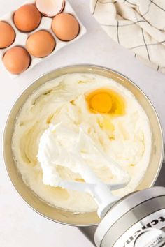 an image of eggs and cream in a bowl