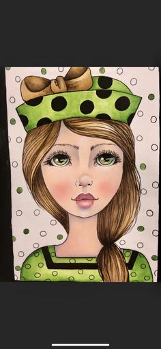 a drawing of a girl with green eyes and a polka dot hat on her head