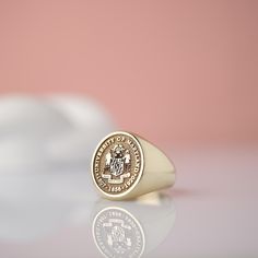 Introducing our stunning 14k Solid Gold custom college class signet ring! This exquisite piece is the perfect way to commemorate your academic achievement in style. Crafted with top-quality materials, this unique ring can be tailored to feature your graduation year or college insignia for a personalized touch. Whether as a gift for yourself or a loved one, this ring is sure to be cherished for years to come. Make a statement with this timeless keepsake that celebrates your academic journey in a luxurious and meaningful way. A must-have addition to any jewelry collection! Silver : 8.30 gr Medium Silver : 11.30 gr Big Silver : 13.70 gr  ⚙️Product Details: Small--Front Size: 13mm x 14.5mm Medium--Front Size: 15.10mm x 17.10mm Big--Front Size: 17mm x 19mm 🎀Silver It is produced from 925 sterl Classic 14k Stamped Signet Ring For Commemoration, Classic Personalized Signet Ring For Commemoration, Personalized Classic Signet Ring For Commemoration, Class Rings College, College Class, Graduation Year, College Classes, Academic Achievement, Gold Signet Ring