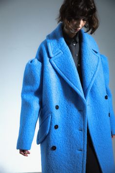 Drop-shoulder coat, virgin wool, sky blue. Crafted in soft alpaca and luxe virgin wool, this sky blue statement coat epitomizes femininity imbued with playfulness. Accented by pleated dropped-shoulders, it creates a fierce, unexpected silhouette. Chic Blue Wool Coat, Chic Blue Wool Coat For Fall, Chic Blue Wool Outerwear, Blue Wool Long Coat, Chic Blue Wool Coat For Winter, Drop Shoulder Coat, Blue Crafts, Statement Coat, Secret Sale